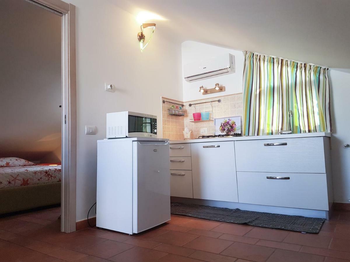 Mansarda Con Vista Piscina Villa Campofelice di Roccella Kültér fotó